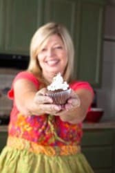 cheri liefeld holding a cupcake