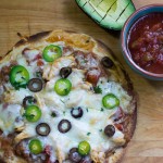 Chicken Enchilada pizza on table