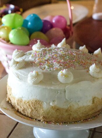 plate with the key lime cake on top.