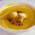 A bowl of Curried Butternut Squash Pear Soup