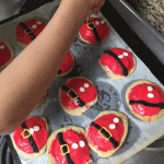cookie sheet of santa belly sugar cookies