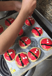 cookie sheet of santa belly sugar cookies