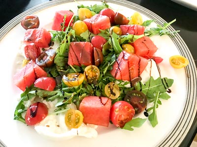 Plate of watermelon tomato salad