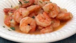 bowl of shrimp scampi with beer