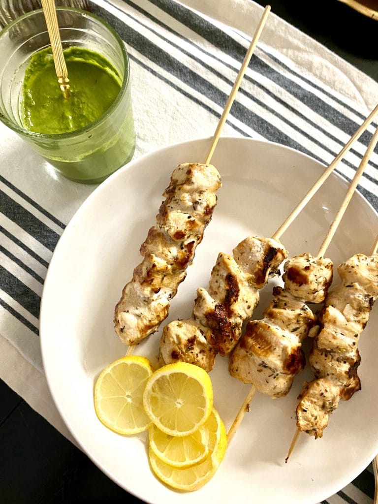 plate of grilled lemon chicken skewers