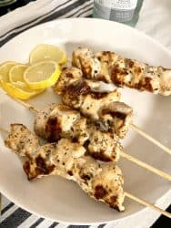 Plate of Grilled lemon chicken skewers