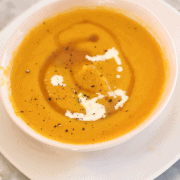 pink bowl of roasted butternut apple SOup