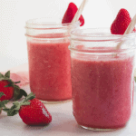 two mason jars with tropical protein shakes