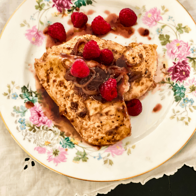 Flowered china plate with raspberry balsamic chicken